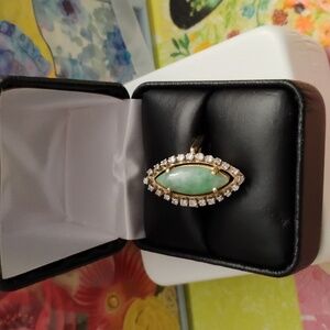 Genuine 14 Karat Gold ring with diamonds and jade gemstones.